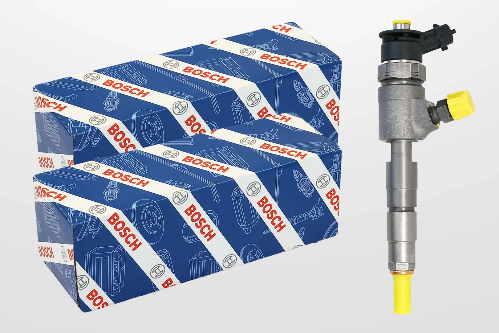 Wtryskiwacz Bosch przy opakowaniach produktowych Wtryskiwacz Bosch Common Rail zaprezentowany obok niebieskich opakowań z logo producenta